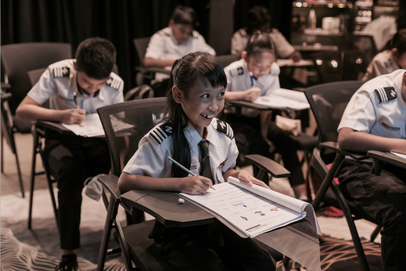 Junior Aviator Happily Learning Aviation Course