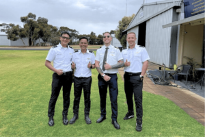 Photo Of Instructor With His Students