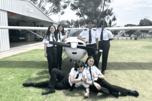 Photo of Youth Aviator Pilot Students and Plane