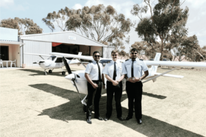 Youth Pilot Group Photo Near Hangar